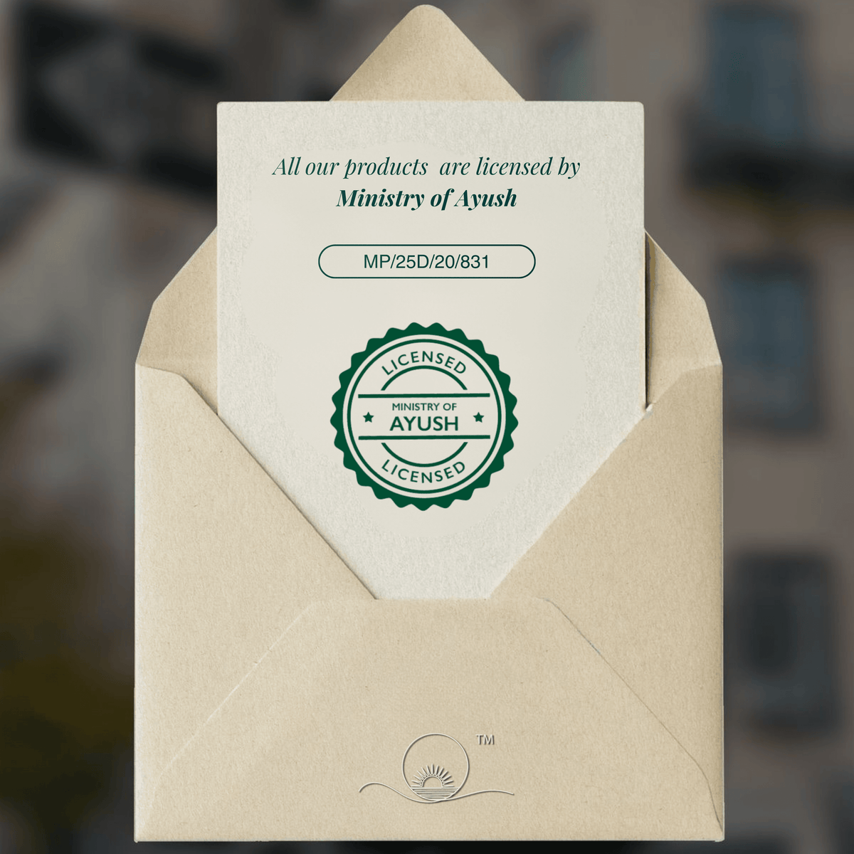 AYUSH Ministry licence certificate for Calma Anti-Anxiety Gummies shown inside an envelope